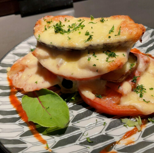 Grilled eggplant and tomato with cheese