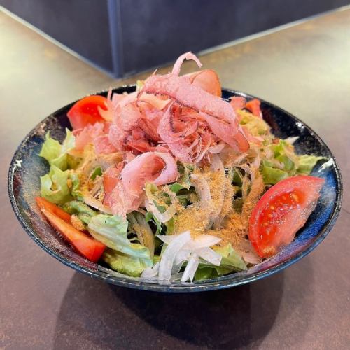 Japanese-style salad topped with freshly shaved bonito flakes