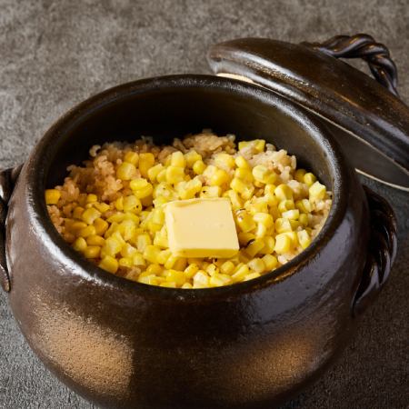 Corn rice cooked in clay pot