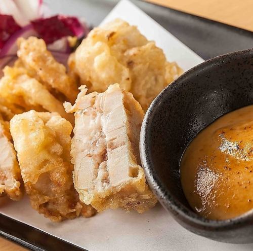 Fried shrimp and lotus root scissors with charred sea urchin sauce