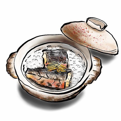 Charcoal-grilled fatty mackerel rice in an earthenware pot