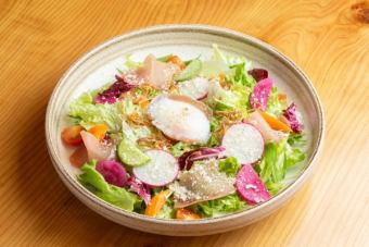 Caesar salad with soft-boiled egg and uncured ham with freshly shaved cheese