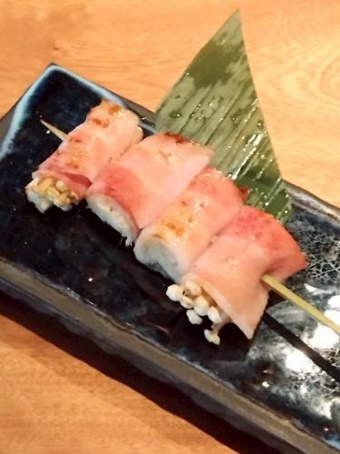 Enoki mushrooms wrapped in bacon