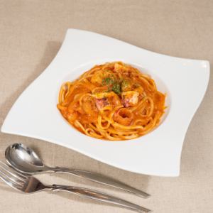 Tomato cream pasta with squid and shrimp