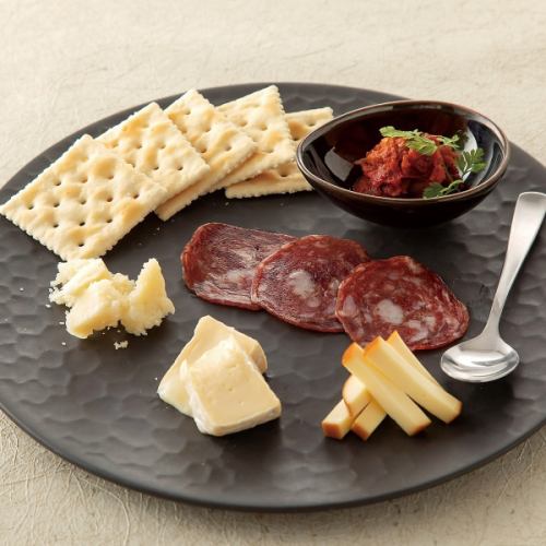 Assortment of three kinds of cheese and salami