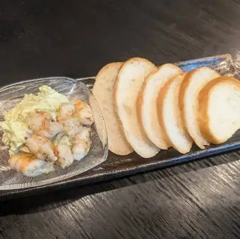 Shrimp and avocado tartare with baguette