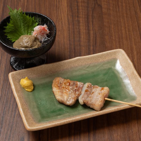 【クセになる味わい】網走ポークの豚バラ串＆蟹ミソ