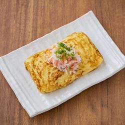 Tamagoyaki (egg roll) with red snow crab