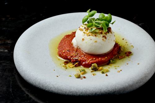 Burrata cheese and tomato miso condiment