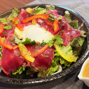 Tuna and avocado salad topped with sashimi egg and soft-boiled egg