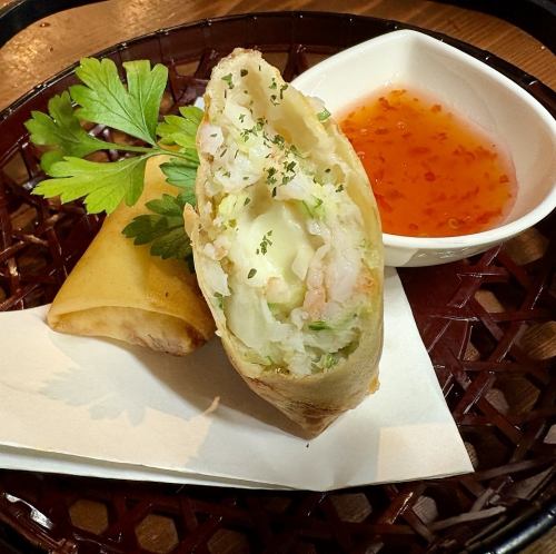 Stretchy mozzarella cheese and pounded shrimp spring rolls