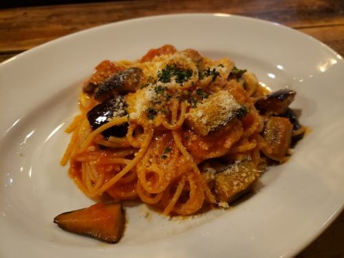 Tomato sauce pasta with eggplant, mozzarella and basil