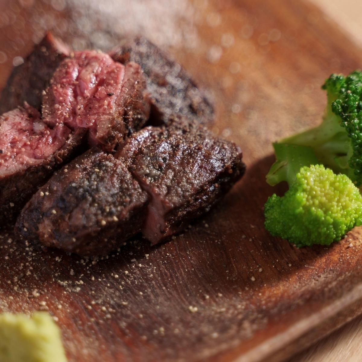 The charcoal-grilled meat is juicy and full of flavor.