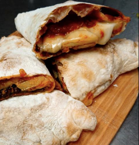 Bolognese, mashed potato and cheese calzone