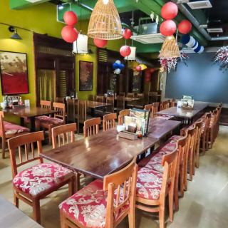 There are six tables that seat six people.We can accommodate large groups, so please feel free to come and visit us.