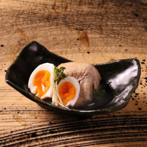 Soft-boiled egg and chicken wings