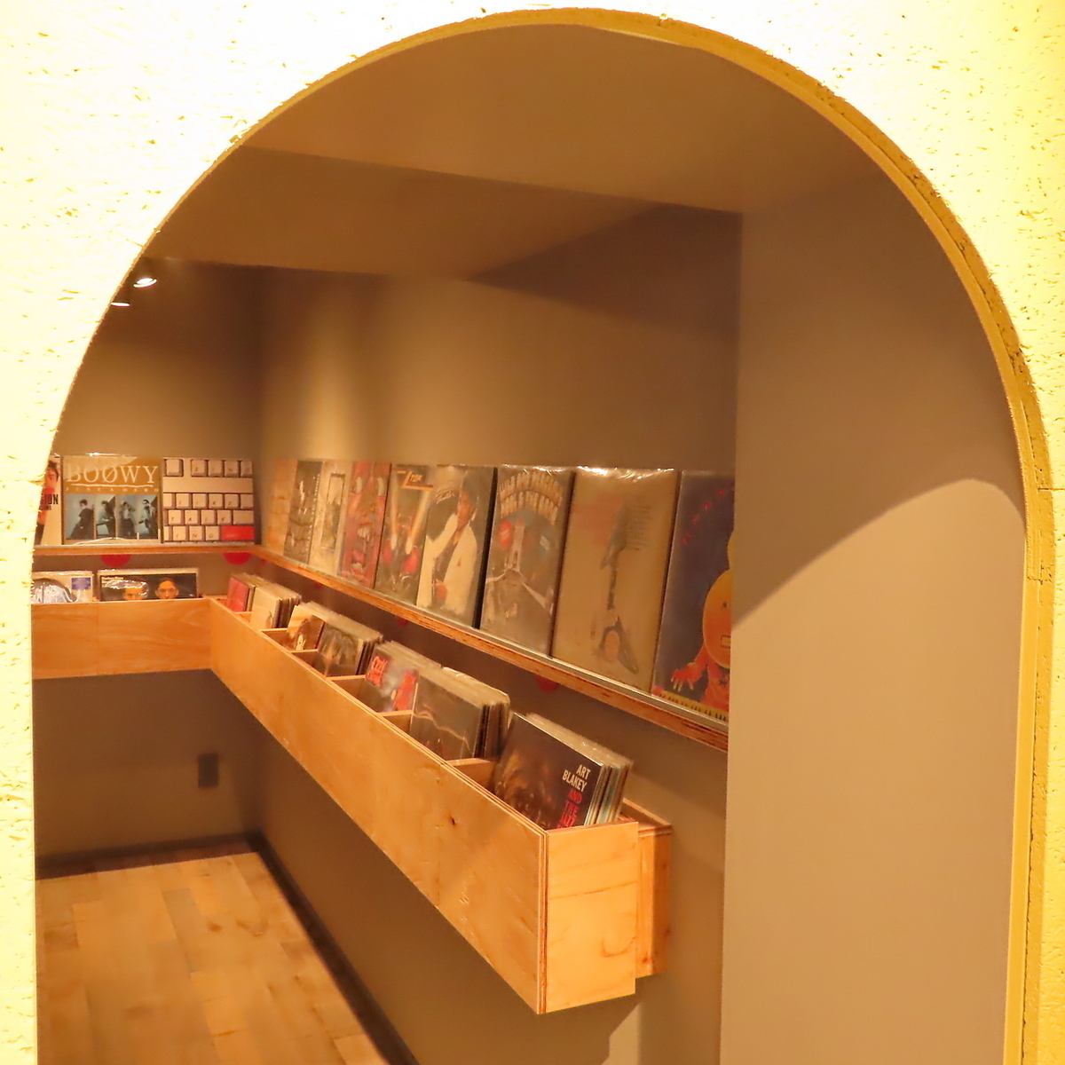 The cafe-style store, which is filled with records, has a stylish and relaxed atmosphere.
