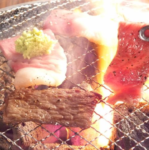 Grilled meat cooked on a charcoal grill using domestically produced binchotan charcoal
