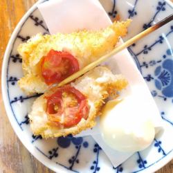Fried tomato cheese skewers
