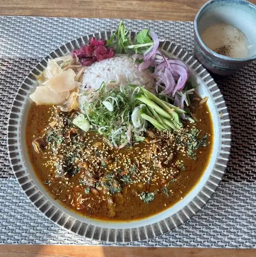 Beef tendon curry served with grated yam soup and condiments (available only in August)
