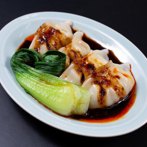 Black and spicy dumplings (4 pieces)