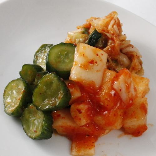 Assorted Chinese cabbage kimchi, cucumber kimchi, radish kimchi, and namul