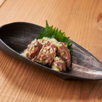 Soft liver covered in green onions