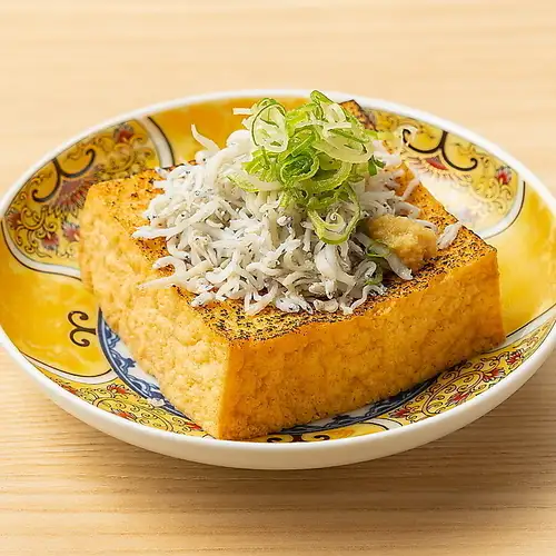 裹着干沙丁鱼的炸豆腐