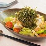 Crispy small sardines and seaweed salad with radish (Japanese style mayonnaise dressing)