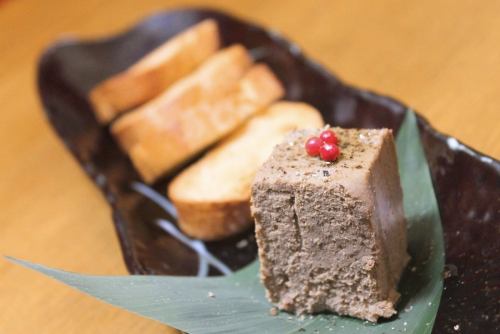 Homemade liver pâté served with baguette