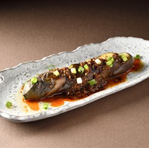 One chilled steamed eggplant with hot spicy sauce