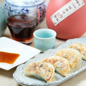 Assortment of four types of grilled dumplings