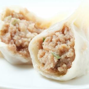 Boiled gyoza dumplings made with mackerel, a specialty of Dalian