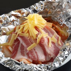 Pork kimchi and melted cheese baked in foil