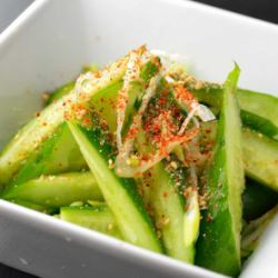 Cucumber with chopped green onion and salt