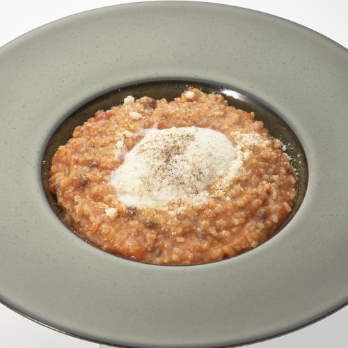 自家製ミートソースと袖ヶ浦産プリンセスエッグの半熟卵のリゾット