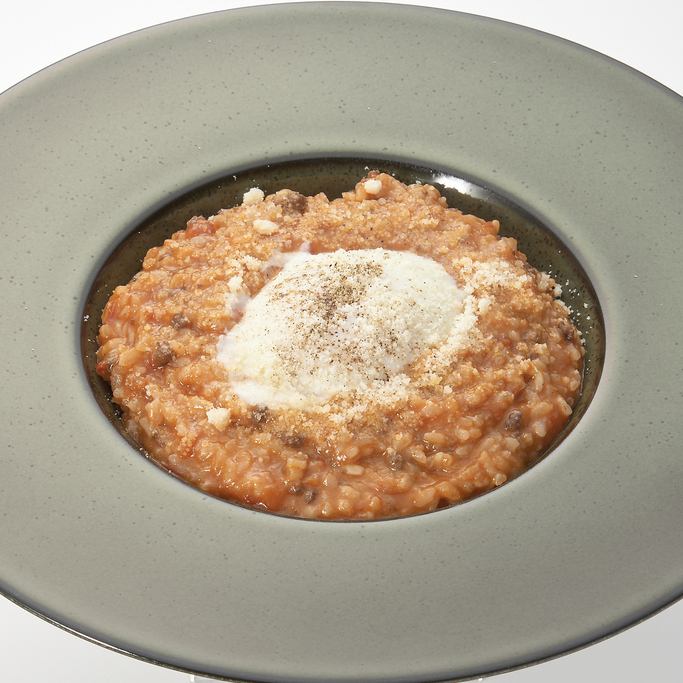 自家製ミートソースと袖ヶ浦産プリンセスエッグの半熟卵のリゾット