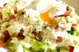 Caesar salad with soft-boiled egg and dry-cured ham