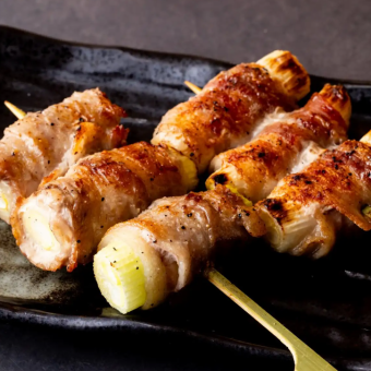 Long green onion wrapped in meat