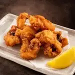 Deep-fried octopus with aromatic herbs