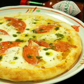 Mozzarella and basil pizza / garlic and anchovy pizza
