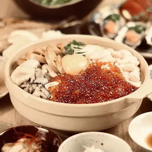 A decadent, gout-inducing clay pot rice dish!