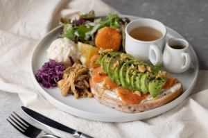 Smoked salmon and avocado open sandwich plate