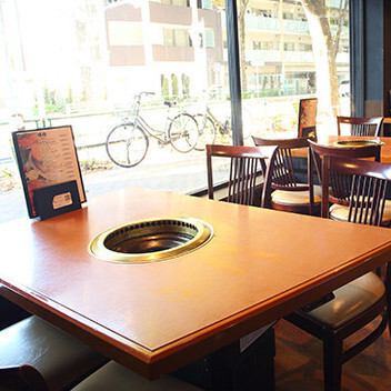 We offer glass-walled table seating with an open feel.