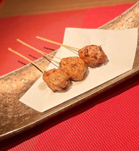 Deep-fried skewers of Iwate duck meatballs