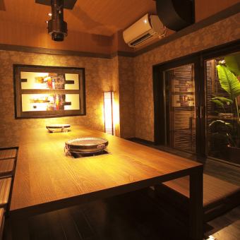 A room full of style with a view of a Japanese-style garden