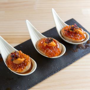 Boiled egg with salmon roe and sea urchin