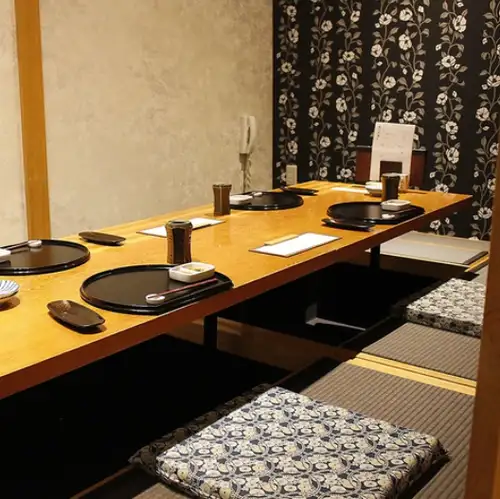 We have two private rooms available, each accommodating 6 people.