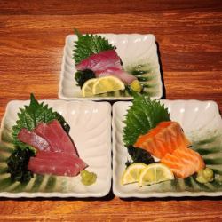 Yellowtail, salmon, tuna, and various other sashimi