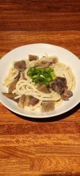 Beef tendon and garlic stir-fried udon